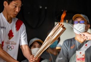 Olympic Flame Arrives Tokyo After Spectators Ban