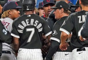 White Sox manager Tony La Russa charges to the support of Jose Abreu, who was beaned; benches clear